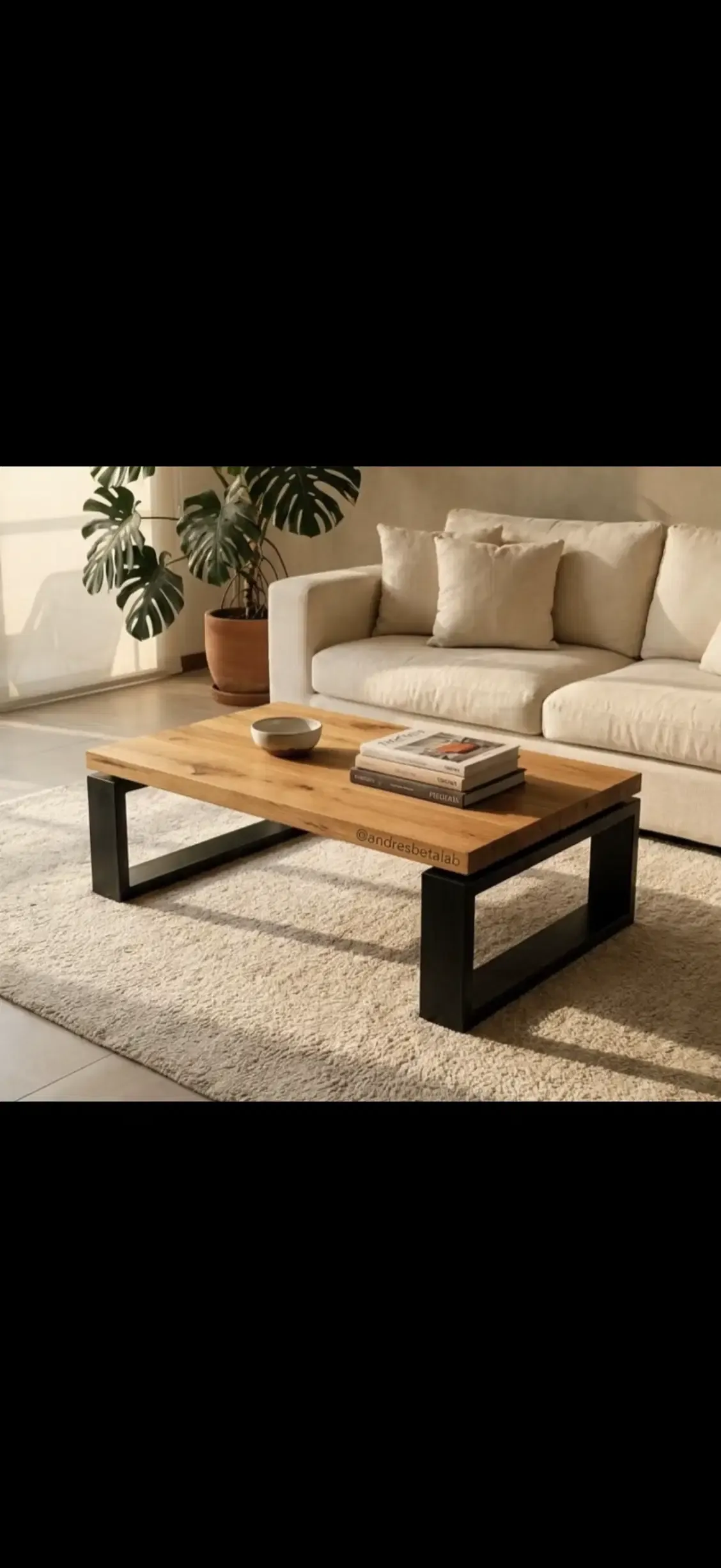 Oak coffee table with a black rectangular steel frame in a living room